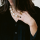 The cooling gel concealed within the beads of “Hot Girls Pearls” offers relief from hot flashes.
